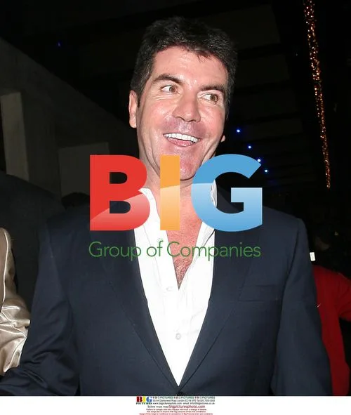Simon Cowell Leaves Mayfair Hotel