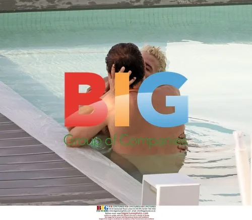 Paul Sculfor films kissing scene in pool