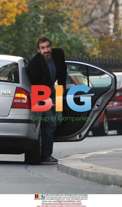 Eric Cantona with wife and newborn son