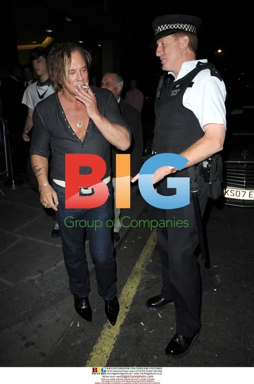 Mickey Rourke Poses With London Policeman