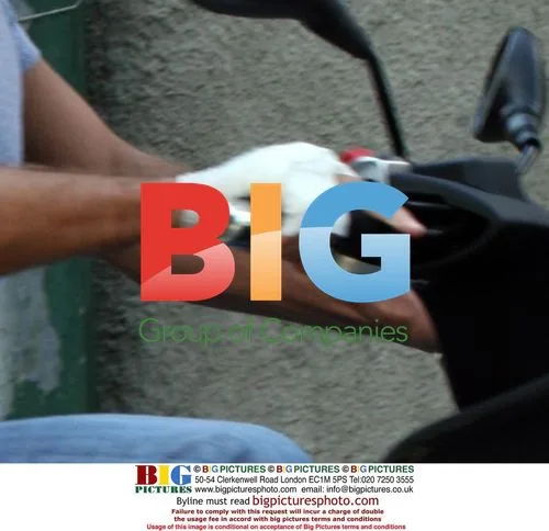 George Clooney Rides Scooter with Bandaged Hand