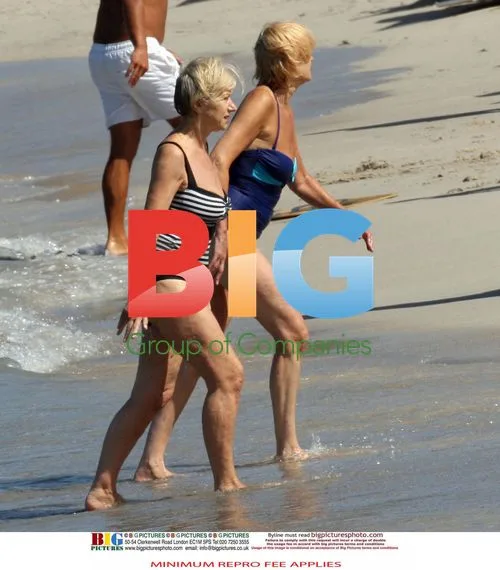 Helen Mirren Sunbathing on Beach in Italy