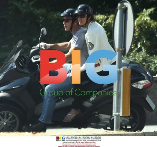 George Clooney Rides Scooter with Girlfriend
