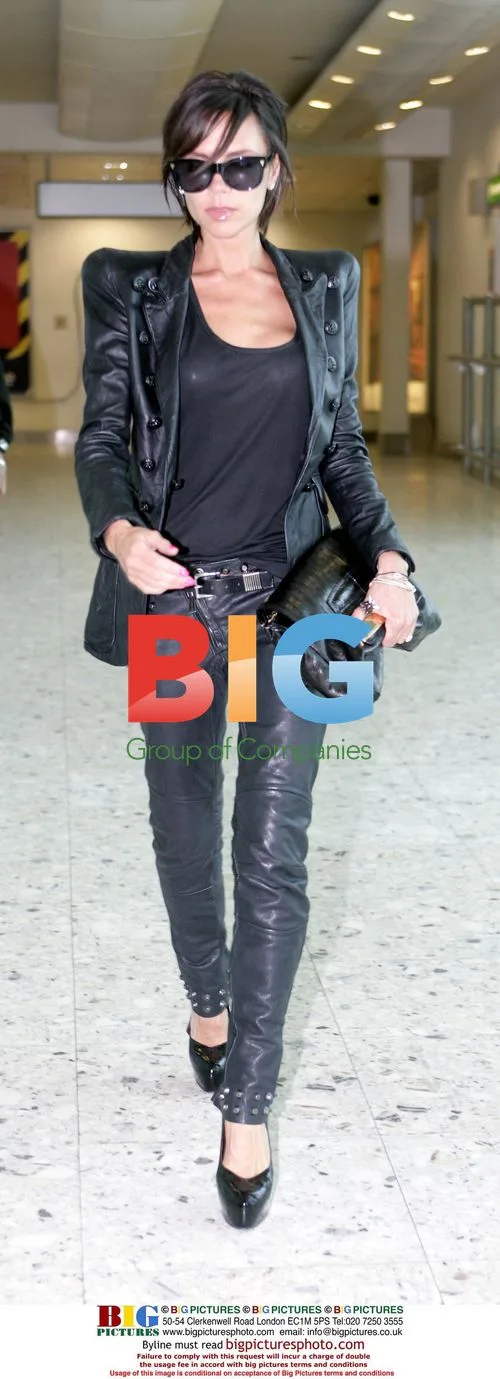 Victoria Beckham Arrives at Heathrow for London Fashion Week