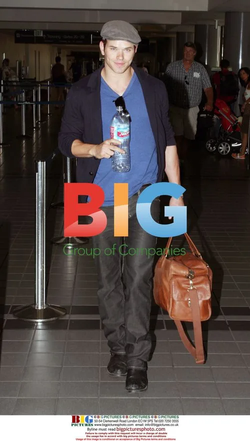 Kellan Lutz Quenches Thirst at LAX