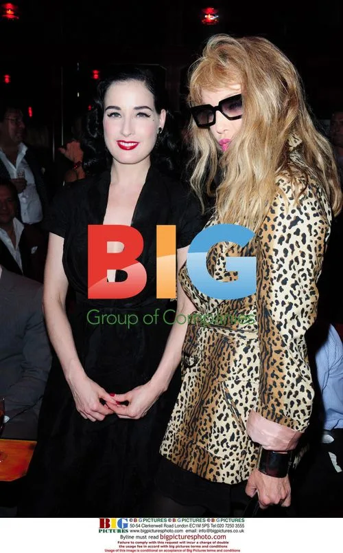 Dita Von Teese & Arielle Dombasle at Paris Premiere