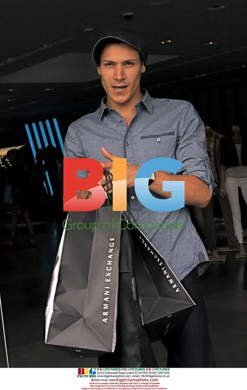Alex Meraz Shops at Armani Exchange