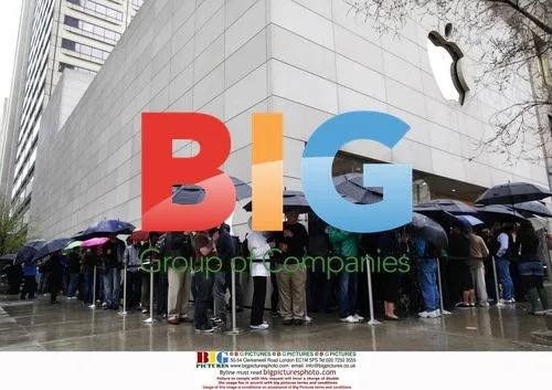Customers wait outside Apple store for iPad launch