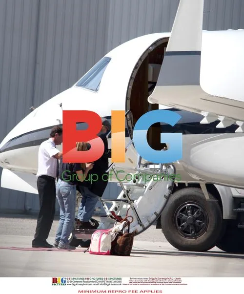 Celebrities Boarding Private Jet