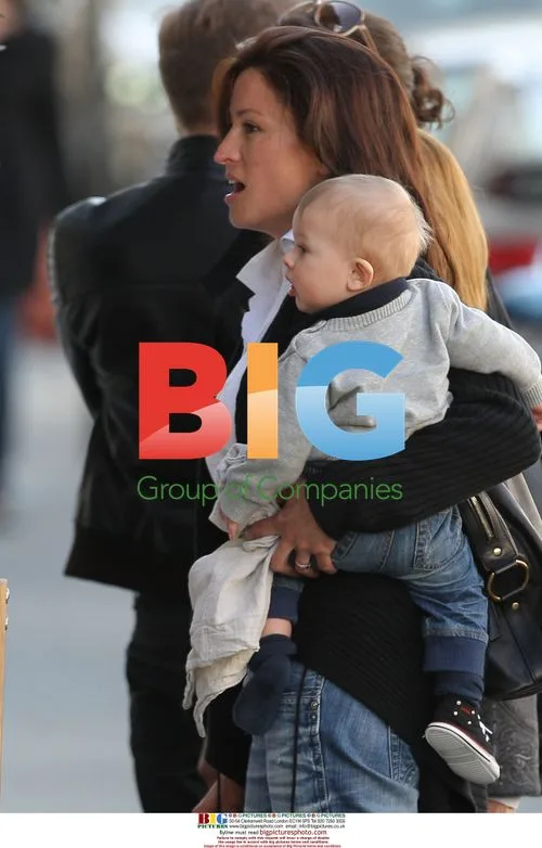 Rebecca Loos with son Magnus in London