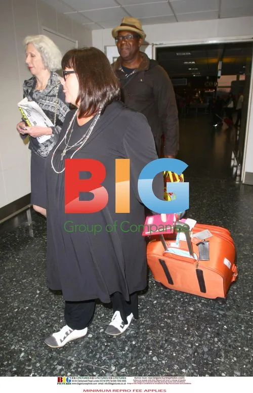 Lenny Henry and Dawn French return from Caribbean holiday