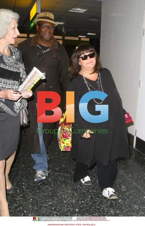 Lenny Henry and Dawn French arrive from Caribbean holiday