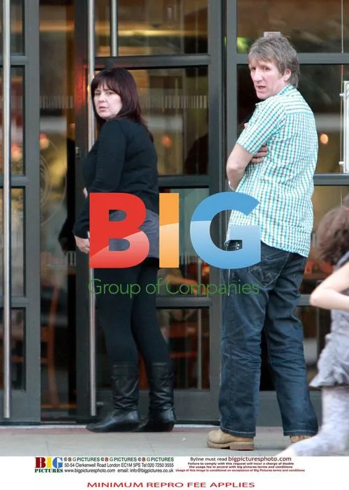 Coleen Nolan and Husband Ray Smoke Outside Restaurant