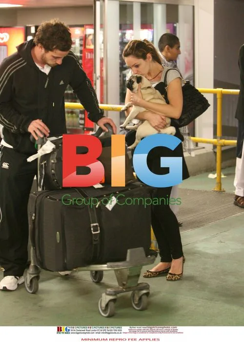 Kelly Brook Arrives at Heathrow with Danny Cipriani