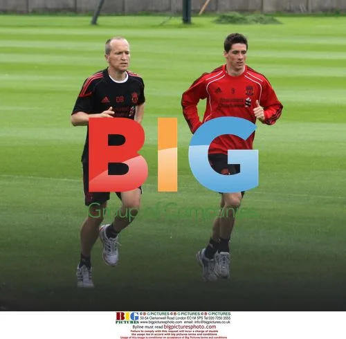 Torres, Kuyt Back in Liverpool Training