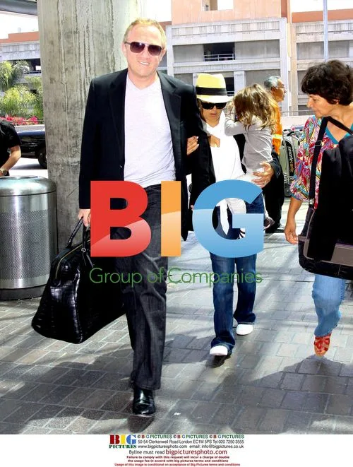 Salma Hayek, Francois Pinault, and daughter at LAX