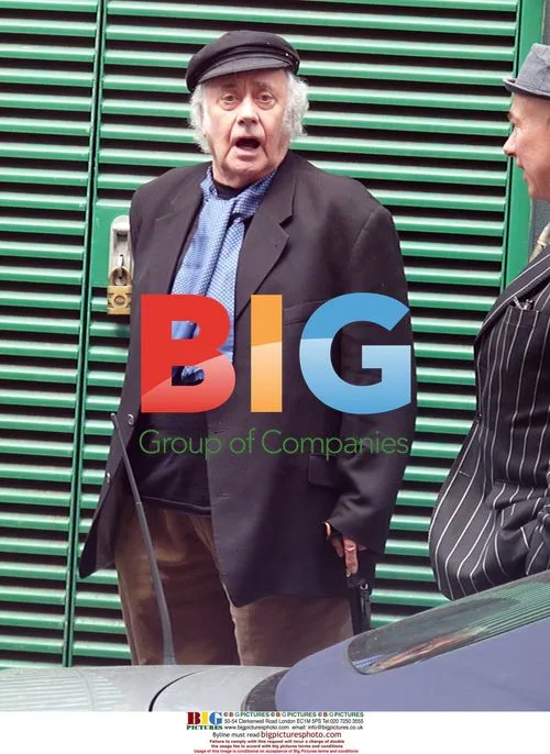 Actor Victor Spinetti leaving the Ivy in London