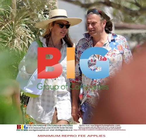 Jerry Hall with Boyfriend on Beach
