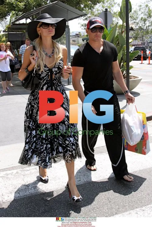 Paris Hilton shopping with boyfriend Cy Waits