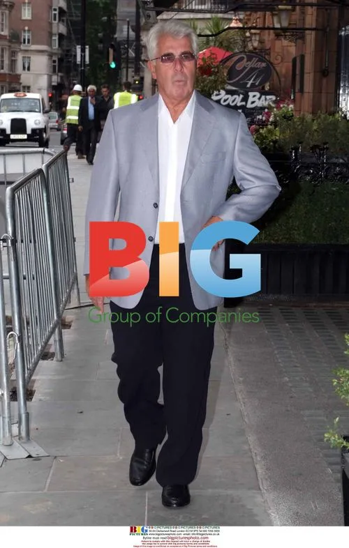 Max Clifford Leaving Restaurant