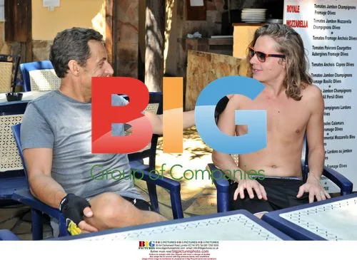 Nicolas Sarkozy with son Pierre on holiday
