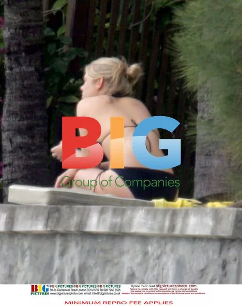 Chelsy Davy Relaxes on Beach