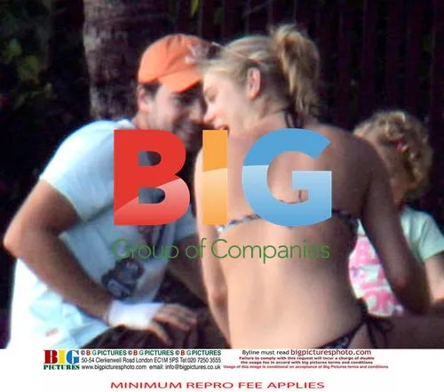 Chelsy Davy relaxes on beach