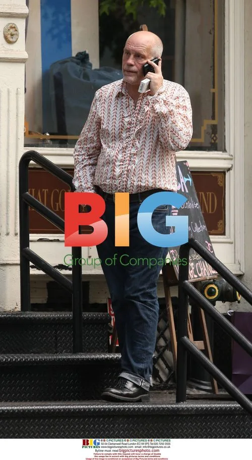John Malkovich Walks in SoHo