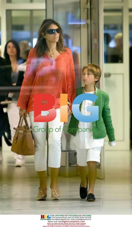 Liz Hurley, Arun Nayar and son Damian at Nice airport