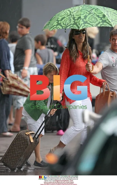 Liz Hurley and family arrive at Nice airport