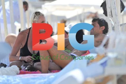 Brigitte Nielsen on Beach with Boyfriend and Dogs