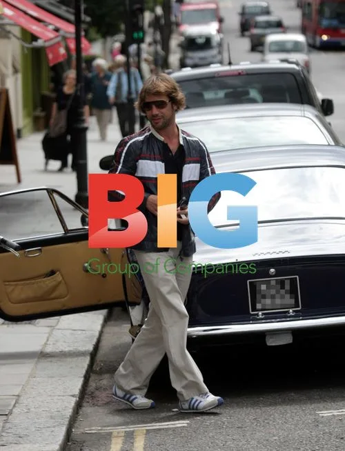 Jay Kay of Jamiroquai in Vintage Ferrari