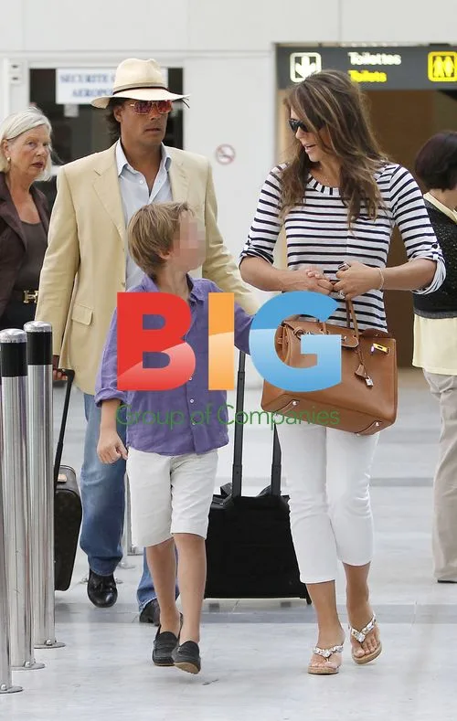 Liz Hurley and family at airport