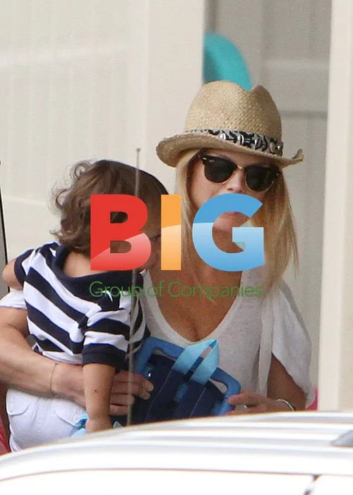 Elin Nordegren and Son Charlie Woods in Orlando