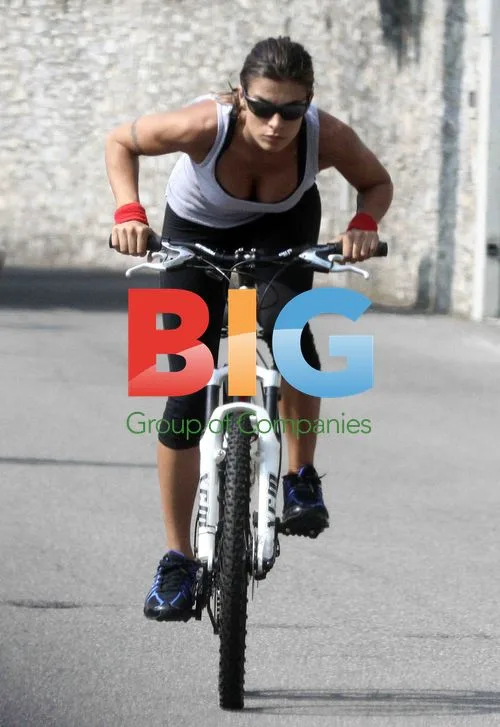George Clooney on bike ride with Elisabetta Canalis