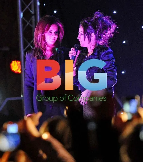 Cher Lioyd performs with Cheryl Cole