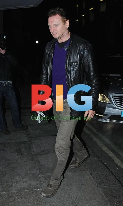 Liam Neeson Arriving at London Hotel