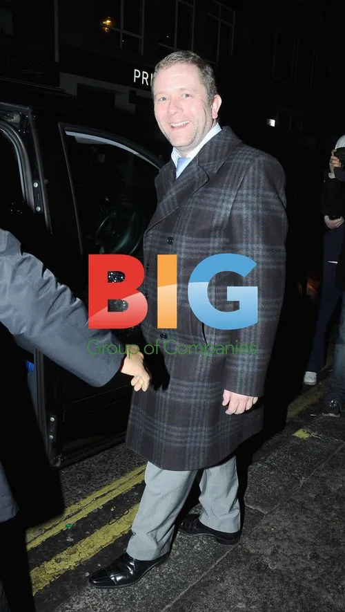 Comedian John Culshaw chats with blondes outside Groucho\'s