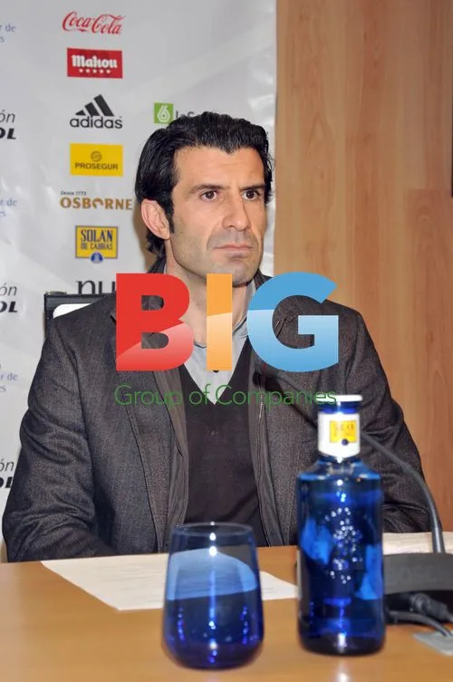 Iker Casillas and Luis Figo at charity event