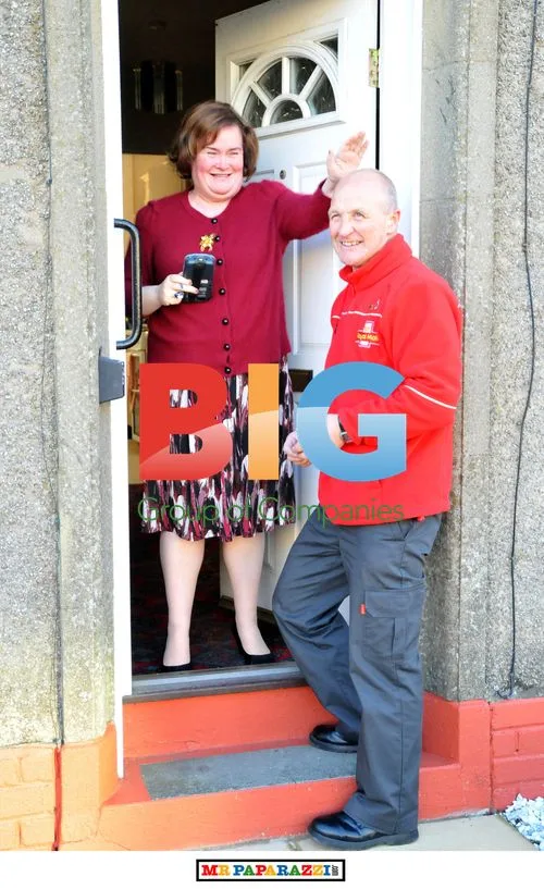 Susan Boyle and Postman in Playful Moment
