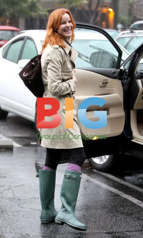 Marcia Cross Shopping in Green Boots