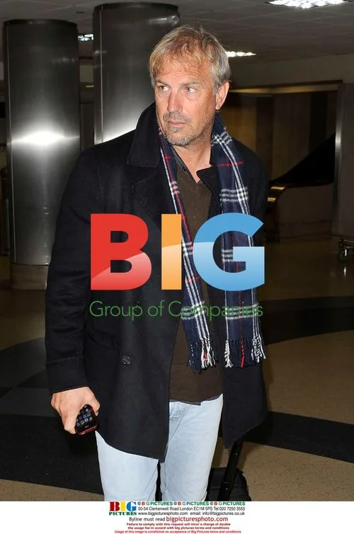 Kevin Costner Arrives at LAX