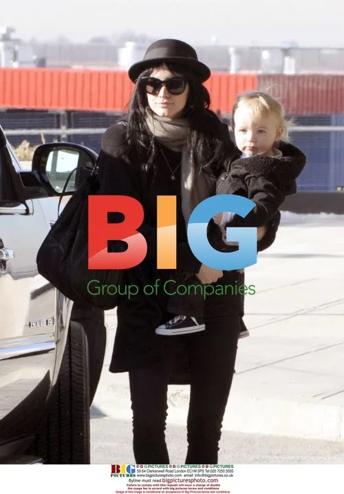 Ashlee Simpson and Family at JFK Airport