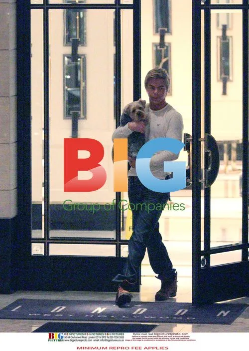 Derek Hough Leaves Cheryl Cole's Hotel