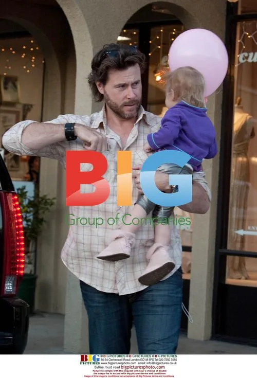 Tori Spelling & Dean McDermott at Lollicut Salon