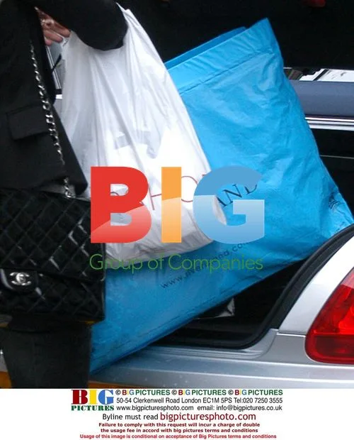 Alex Curran and daughter shopping in Liverpool