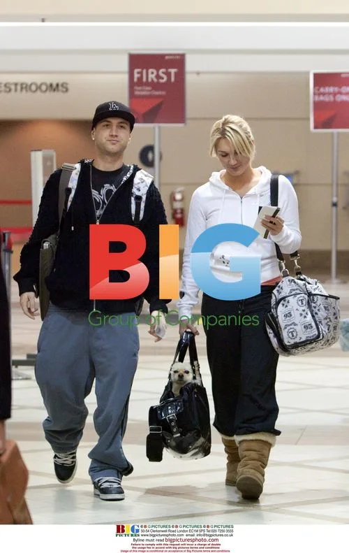 Brooke and Nick Hogan Making Faces at LAX