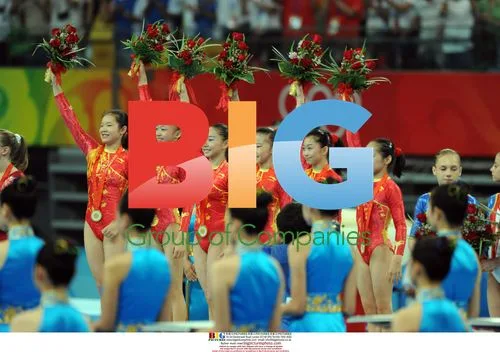 Chinese Gymnasts Celebrate Gold Medal