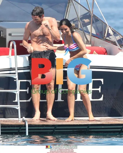 Frank Lampard and Christine Bleakley swim in Italy