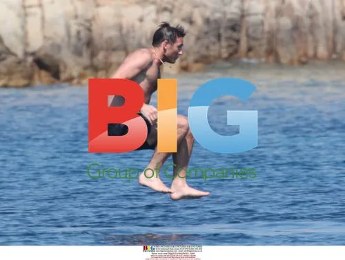 Frank Lampard and Christine Bleakley swim in Italy
